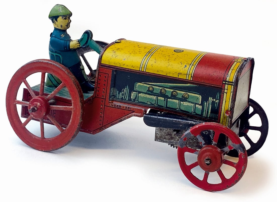 Trattore Pavesi Ingap n. 561: Ditta Ingap, Italia, anni ‘30. Latta litografata; cm 16. Meccanismo a molla funzionante, completo della sua chiave originale integrata. Buono stat