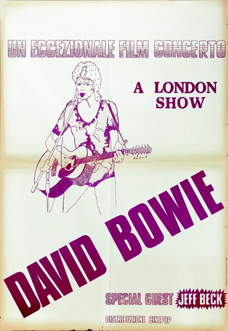 David Bowie - a London Show: ENG> One sheet poster for the David Bowie film “A London Show” featuring Jeff Beck. Folded, some tears at bottom, slight marginal yellowing. Good conditions. IT David Bowie - a London Show Manif