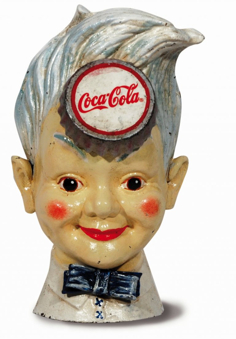 Coca-Cola: Salvadanaio Sprite Boy: Coca-Cola: Salvadanaio Sprite Boy Cast iron piggy bank from the earl 50s. A few lacks of color but overall good conditions, rare. Produzione Americana, n.d. ma primi anni ’50. Ghisa dipinta cm 15x1