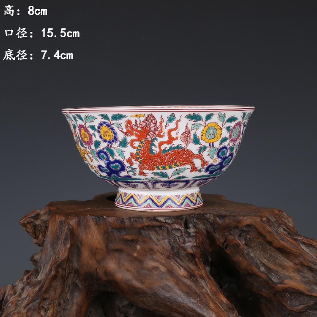 A Nice New Famille Rose Porcelain Bowl: New Made, with Qianlong mark on the bottom. Size is around 13x13x7cm.We have more stock,cheap,so if you want to order more email us please.catherine-dong@163.com