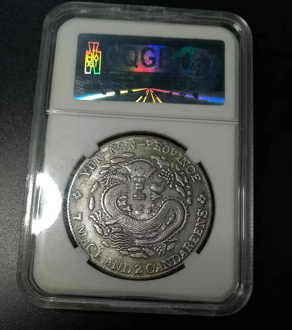 One Old Silver Dragon Coin (1 of 4)