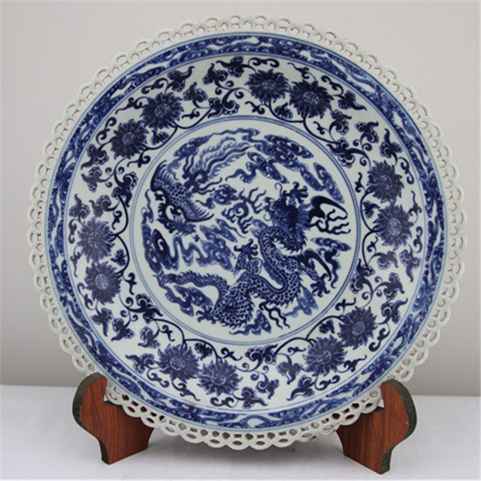 A Large Qing Qianlong Blue and White Porcelain Plate: Qing Dynasty, Qianlong mark and period, nice pheonix and dragon patterns and nice carving around the big plate.Size is H6cm,D32cm, bottom D20.5cm.