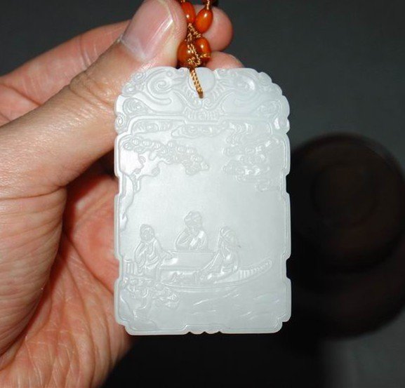 A Nice Antique White Jade Zigang Pendant: Qing Dynasty, Hetian Mutton fat grade white jade. one side with figures and landscape carving and another side with nice characters carvings. Size is around 6.3x4.2x0.7cm.
