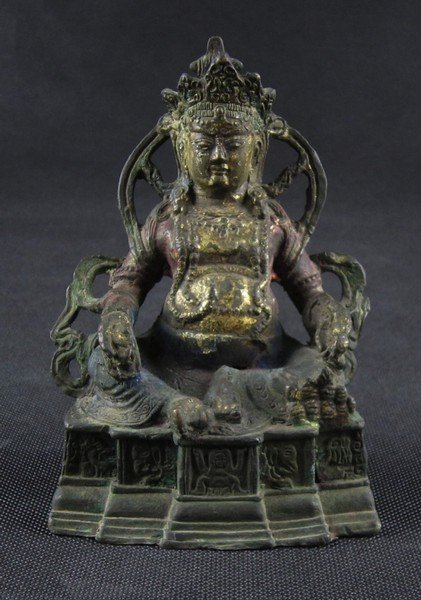 An Antique Gilt Buddha with Nice Colours: Gilt,coloured, copper, Quit possible made Ming or Qing Dynasty. Size is 8.5x7x12.5cm