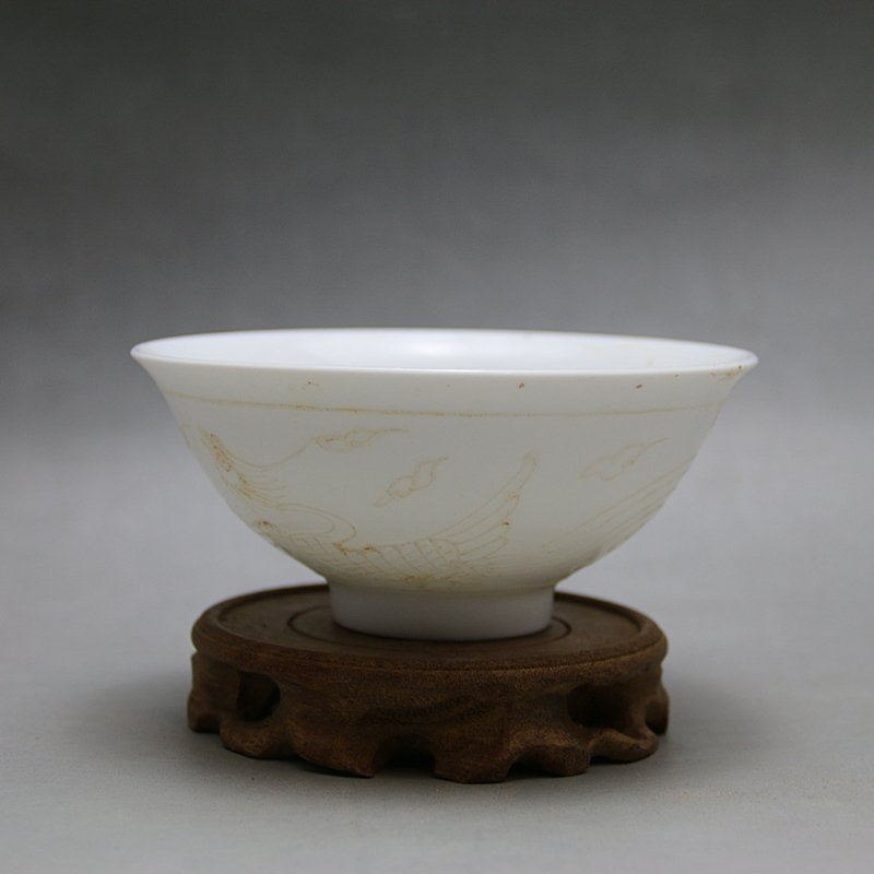 Ming Yongle Sweet White Glaze Phenix Bowl: Ming Dynasty sweet white glaze phenix bowl and with Yongle mark.Size is aroundH5.5cm,D13cm.