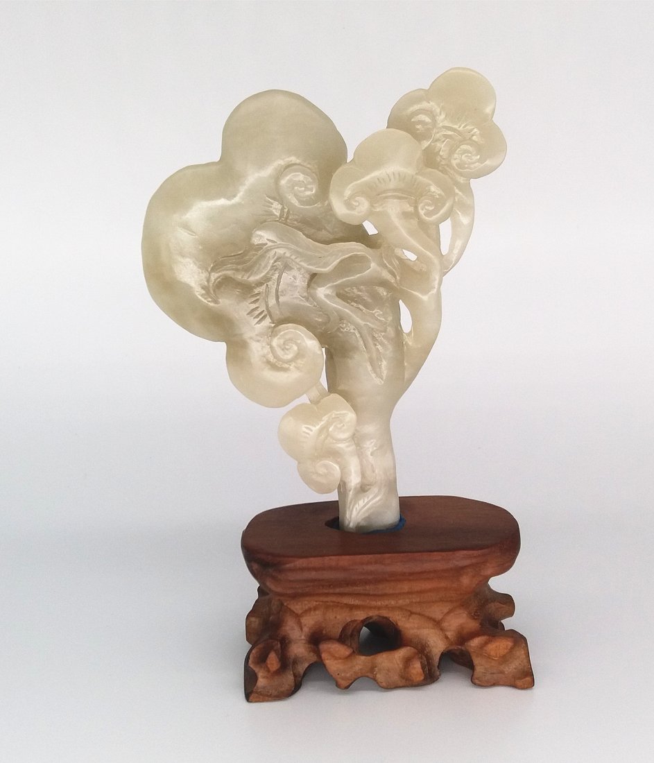 A Nice Hetian White Jade Ruyi Carving (1 of 6)