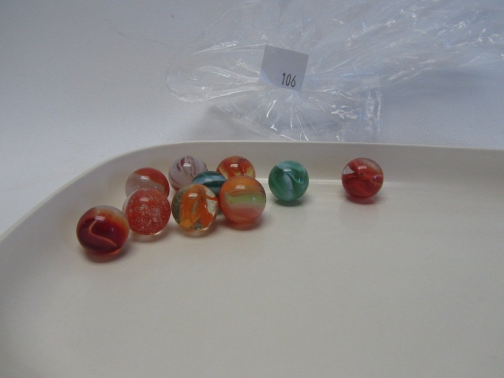 Lot of 10 Vintage/Antique Marbles: Lot of 10 Vintage/Antique Marbles. The newest of these marbles is at least 50 years old. Nice selection of different sizes and patterns