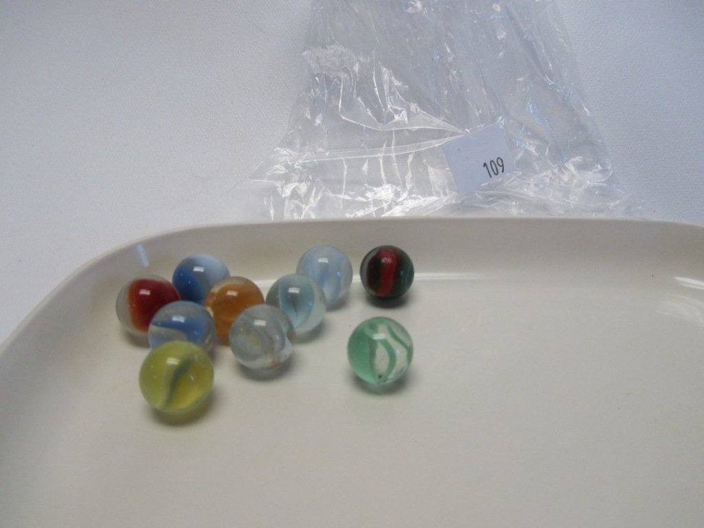 Lot of 10 Vintage/Antique Marbles: Lot of 10 Vintage/Antique Marbles. The newest of these marbles is at least 50 years old. Nice selection of different sizes and patterns