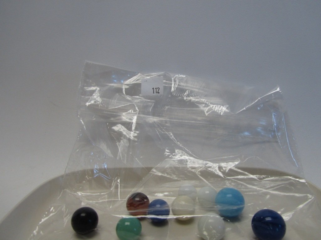 Lot of 10 Vintage/Antique Marbles: Lot of 10 Vintage/Antique Marbles. The newest of these marbles is at least 50 years old. Nice selection of different sizes and patterns