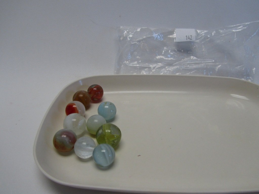 Lot of 10 Vintage/Antique Marbles: Lot of 10 Vintage/Antique Marbles. The newest of these marbles is at least 50 years old. Nice selection of different sizes and patterns