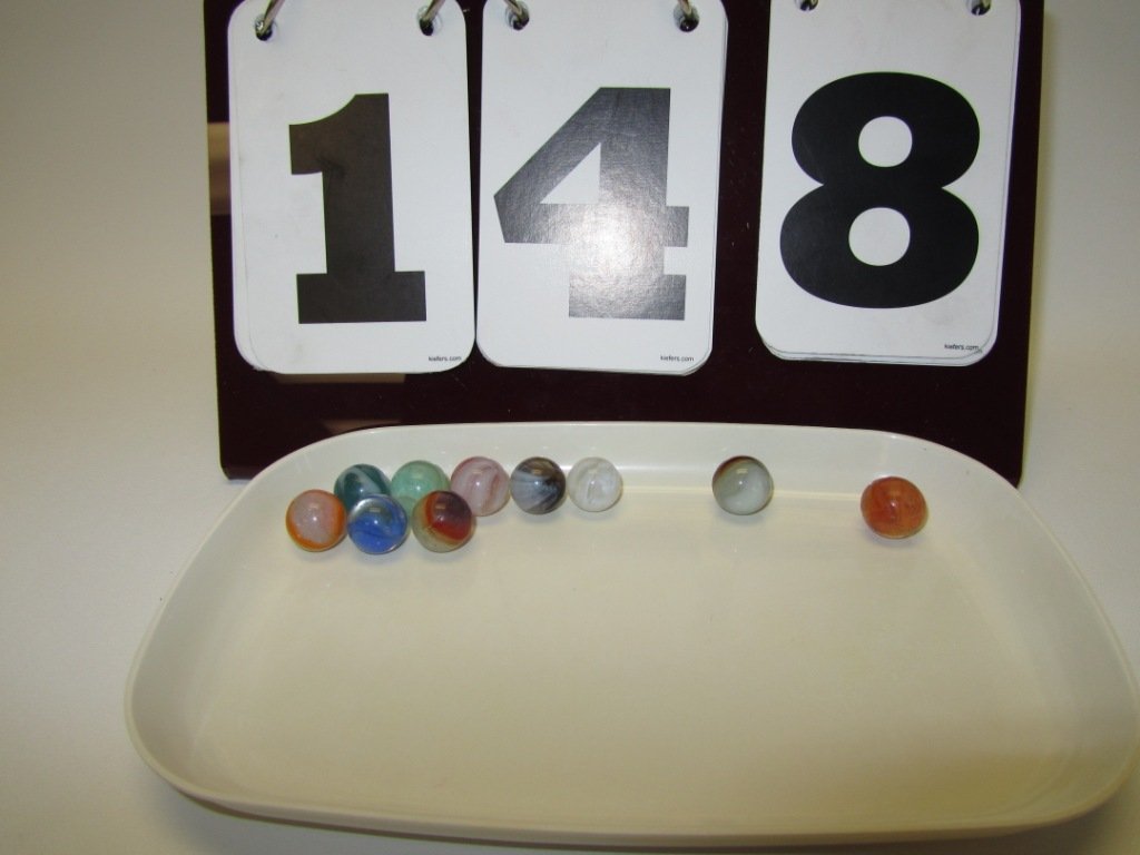 Lot of 10 Vintage/Antique Marbles: Lot of 10 Vintage/Antique Marbles. The newest of these marbles is at least 50 years old. Nice selection of different sizes and patterns