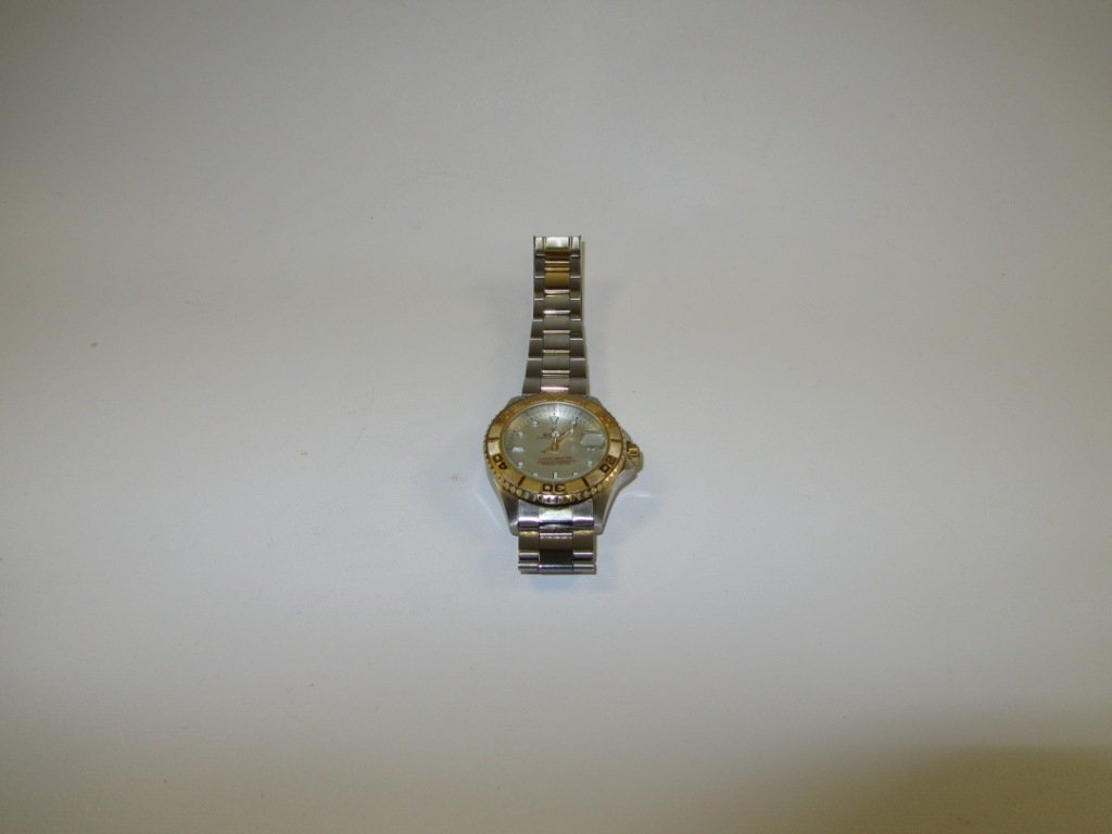Rolex Yacht Master Watch (Imitation): Rolex Yacht Master Watch (Imitation). Very good imitation Rolex, my jeweler had a hard time telling it wasn't real. Self Winding with magnified date. Very nice condition as well.