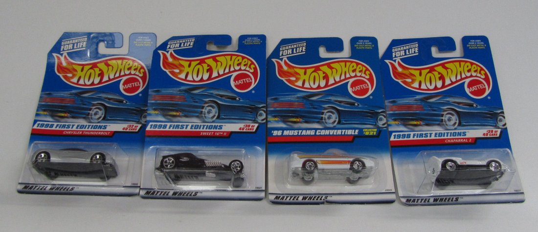 4 New In package Hot Wheels: 4 New In package Hot Wheels. 1998 1st Editions Chaparral 2, 1998 1st Editions Sweet 16 II, 1998 1st Editions Chrysler Thunderbolt, and 96 Mustang Convertible