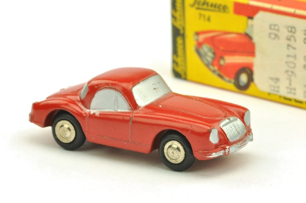 Schuco Piccolo - (714) MG-MGA (im Ork): dunkelrot lackiert, unbespielt, geringe Kratzer in der Frontscheibenschablonierung, sonst neuwertig im sehr guten Ork (eine Hauptseite mit USA-Etikette 50ct, mit Sammelblatt, Kennung 8-1258/750)