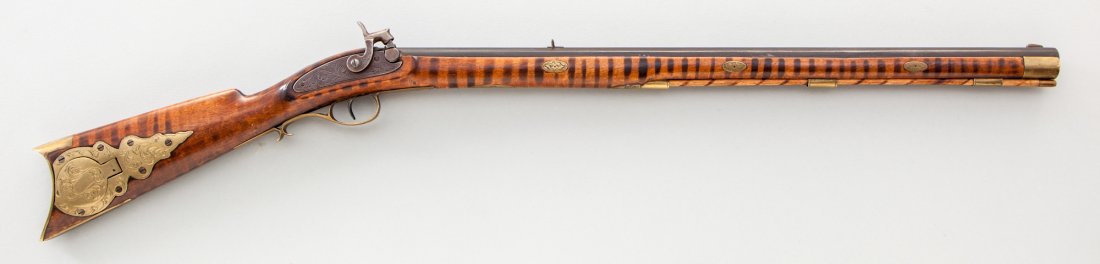 Diminutive Kentucky Rifle, by Ben Kirkland: Diminutive Kentucky Rifle, by Ben Kirkland, .22 cal., 17-1/2'' octagon barrel, miniature lightly engraved percussion lock and hammer, with multiple engraved brass escutcheons, lock retaining plate, tr