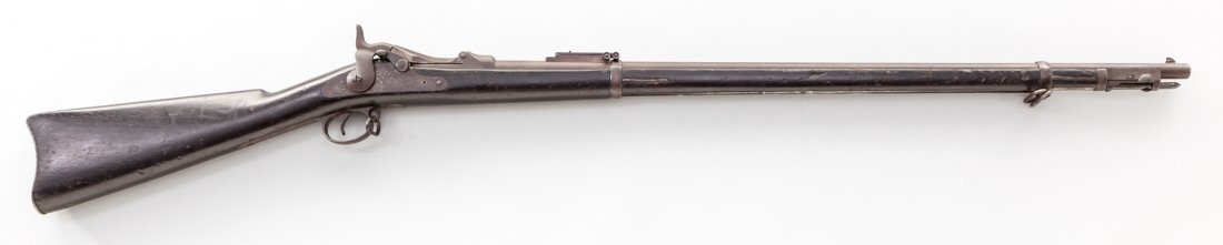 U.S. Model 1884 Trapdoor Springfield Rifle: U.S. Model 1884 Trapdoor Springfield Rifle, #324409, .45-70 cal., 32-1/2'' barrel, originally with blue finish, two-banded walnut stock, rod bayonet, and Buffington rear sight. U.S. marked buttplate w