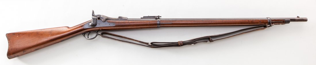 Springfield Model 1884 Trapdoor Rifle: Springfield Model 1884 Trapdoor Rifle, #416396, .45-70 cal., 32'' barrel, blue finish, case hardened breechblock, smooth two-band walnut stock, with slightly later military sling. Breechblock dated 18