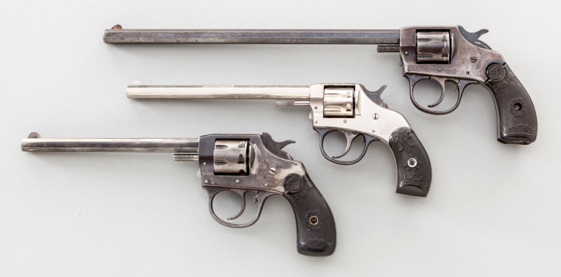 Lot of 3 Small Frame Double Action Revolvers: Lot of Three (3) Small Frame Long-Barrel Double Action Revolvers: (1) Iver Johnson, #29576, .22 cal., 7-shot, 9-1/2'' octagon barrel, frame marked ''Target Model 1900'', blue finish, factory checkered