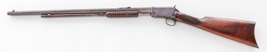 Winchester Model 1890 Pump Action Rifle: Winchester Model 1890 Pump Action Rifle, #410541, .22 Short cal., 24'' octagonal barrel, blue finish, checkered walnut stock. Mfg'd 1910. Condition is very good retaining approx. 80%-85% moderately to