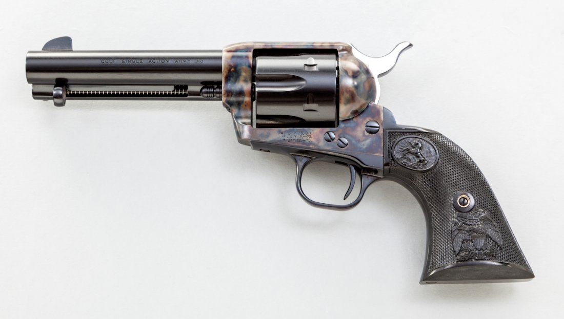 Late 3rd Generation Colt SAA Revolver: Late 3rd Generation Colt Single Action Army Revolver, #S43658A, .45 Colt cal., 4-3/4'' barrel, blue and case hardened finish, Colt factory checkered American eagle black plastic grips with Rampant Col