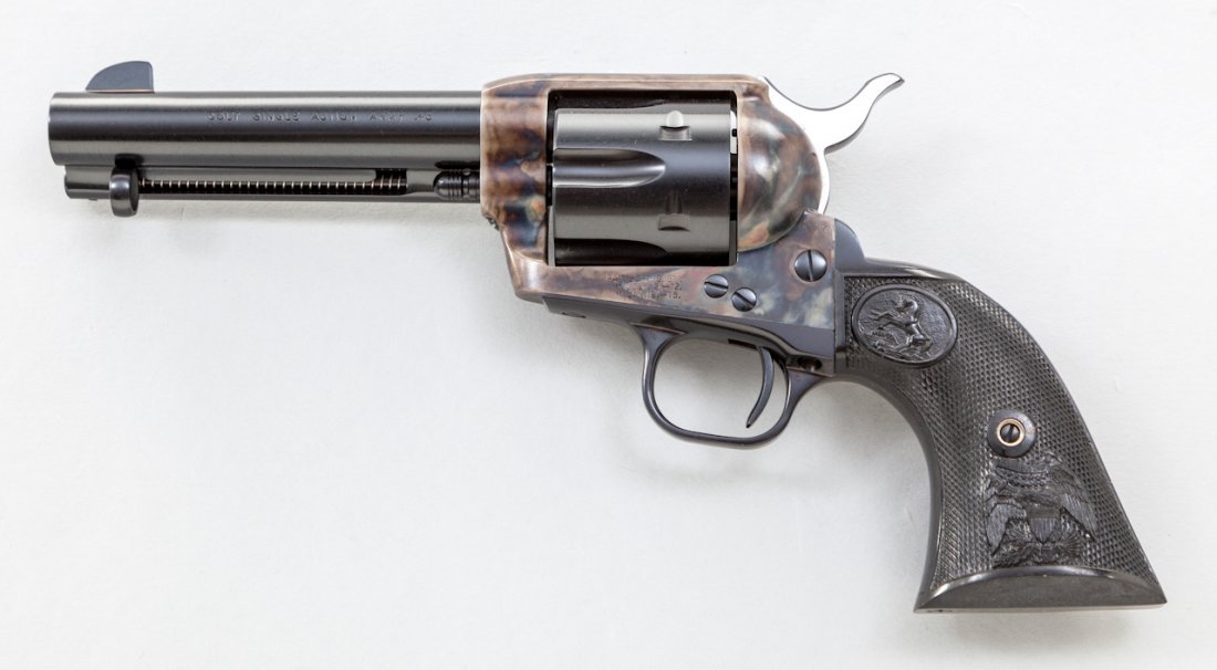 Late 3rd Gen. Colt SAA Revolver: Late 3rd Generation Colt Single Action Army Revolver, #S43660A, .45 Colt cal., 4-3/4'' barrel, blue and case hardened finish, Colt factory checkered American eagle black plastic grips with Rampant Col