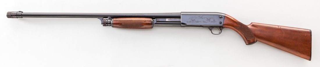 Ithaca Model 37 Pump Action Shotgun: Ithaca Model 37 Pump Action Shotgun, #38331, 16 ga., 26'' barrel with polychoke, blue finish with roll-engraved duck scenes, checkered walnut stock and forend, with Ithaca black plastic buttplate. Con