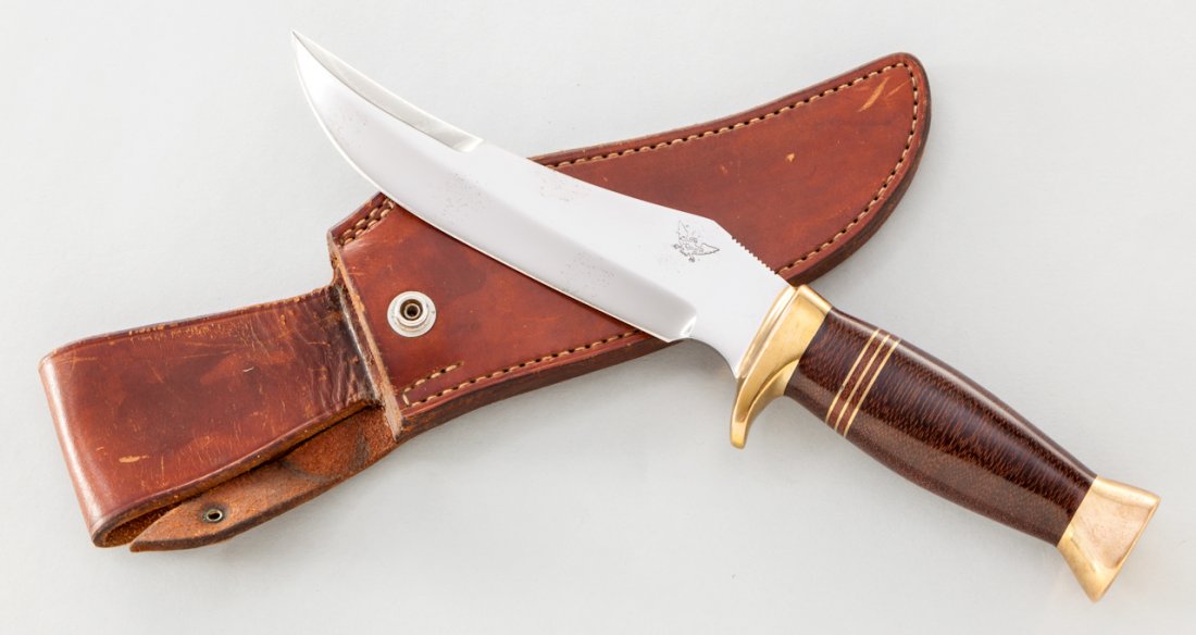 Panamint Fighting Knife, by Cooper: Panamint Fighting Knife, by John Nelson Cooper (1906-1987), 7'' clip-point blade, 11-1/2'' overall, chocolate brown quilted micarta handle with triple brass accents, brass pommel, and brass halfguard.