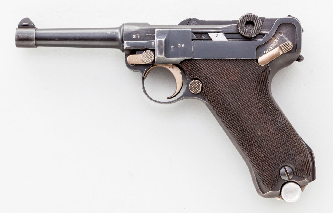 German P.08 Luger Semi-Automatic Pistol, by Erfurt: German P.08 Luger Semi-Automatic Pistol, by Erfurt, #39, 9mm, 4'' barrel, blue finish, straw small parts, with checkered walnut grips, and later extruded blue bodied magazine numbered to the pistol, w