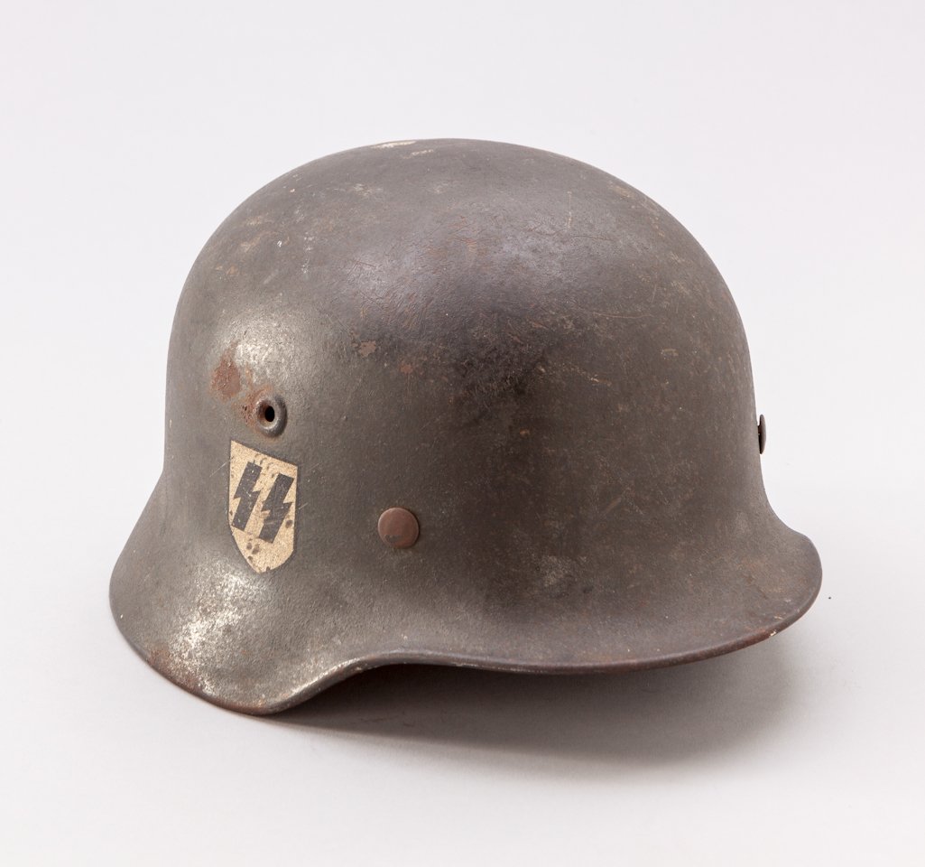 WWII German Waffen SS M-40 Helmet: WWII German Waffen SS M-40 Single Decal Combat Helmet, with 2nd style correct appearing runic decal showing correct high metallic content and thin clear border edge, which is consistent with known ori