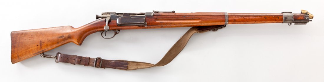 Norwegian Krag Jorgensen Model 1912 Carbine: Norwegian Krag Jorgensen Model 1912 Bolt Action Carbine, #12029, 6.5x55mm, 24'' barrel, blue finish, walnut stock, with original canvas and leather sling, and brass front sight cover. Condition is abo