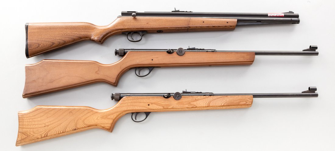Lot of 3 Crosman Pellet Guns: Lot of Three (3) Crosman Pellet Guns: (1) Model 1400, 3rd Varient, .22 cal., with sticker on barrel, hardwood stock. (2) Model 700, .22 cal. tap loader, hardwood stock. (3) Model 707, .177 cal. tap lo