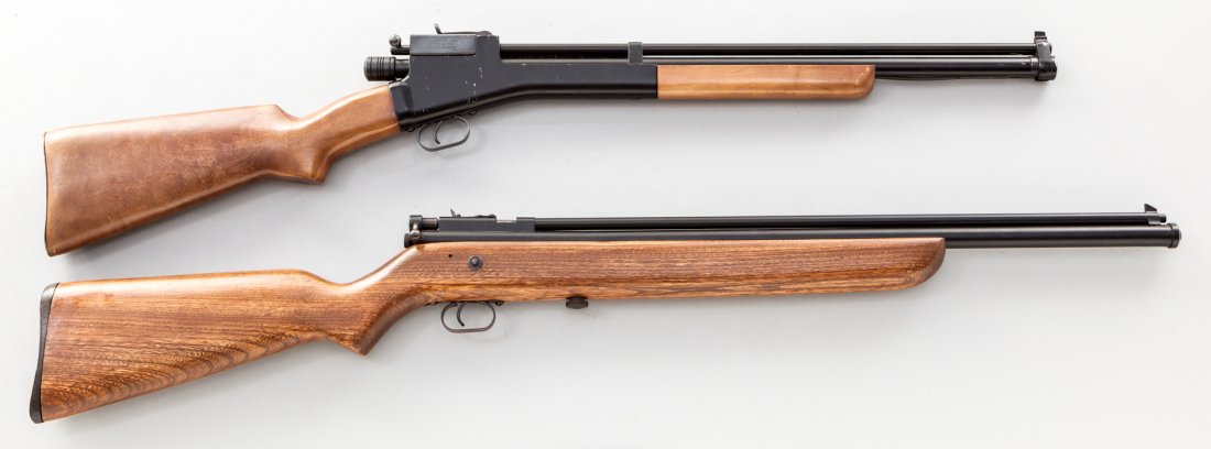 Lot of 2 Crosman Pellet Guns: Lot of Two (2) Crosman Pellet Guns: (1) Model 102 Repeater, .22 cal., 20'' barrel. (2) Model 114, .22 cal., 22'' brass barrel. Both with baked on blue finishes, hardwood stocks. Condition to both is e
