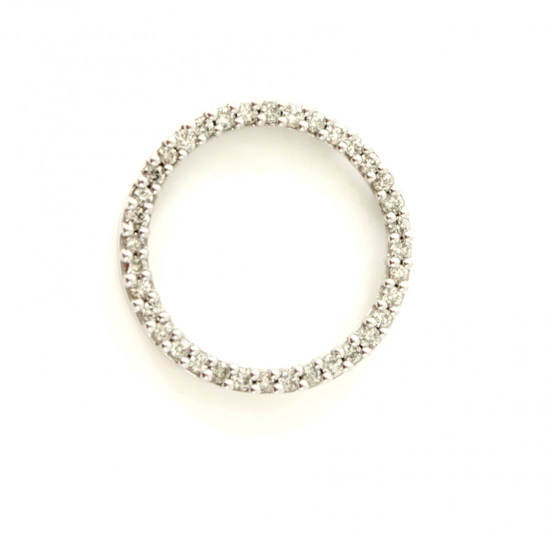 10KT GOLD 1.15 CT DIAMOND ETERNITY CIRCLE PANDANT: A very fine women's 10kt solid white gold CIRCLE ETERNITY PENDANT. This pendant features 1.15 ctw of fine white diamond all round brilliant cut in prong settings. The pendant weighs 3.7 grams, measure