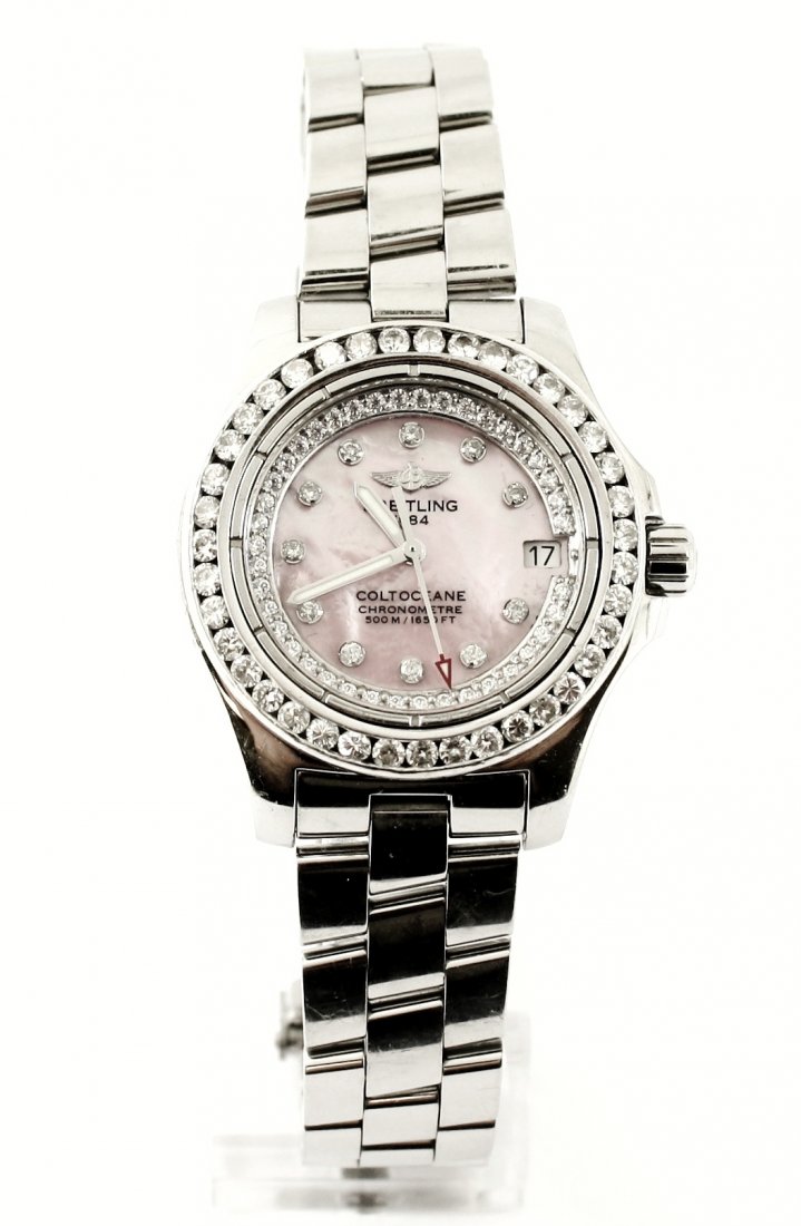 WOMENS BREITLING COLT OCEAN 3.00 CTW DIAMOND WATCH: Up for auction is a very fine stainless steel Breitling colt ocean chronometer quartz watch, with 3.20 CTW custom diamonds on the bezel and the inner dial. The dial is a pink mother of pearl diamond d