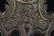 AN ANTIQUE BRONZE CLOCK - 11