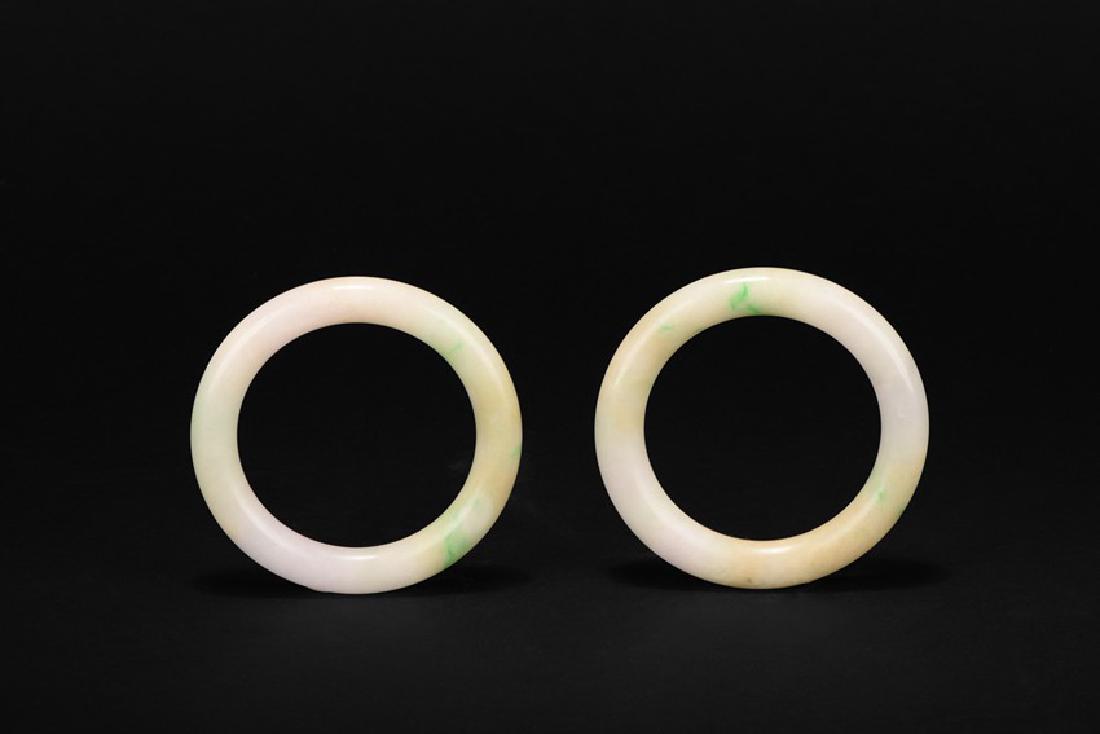 A PAIR OF JADEITE BANGLES (1 of 10)