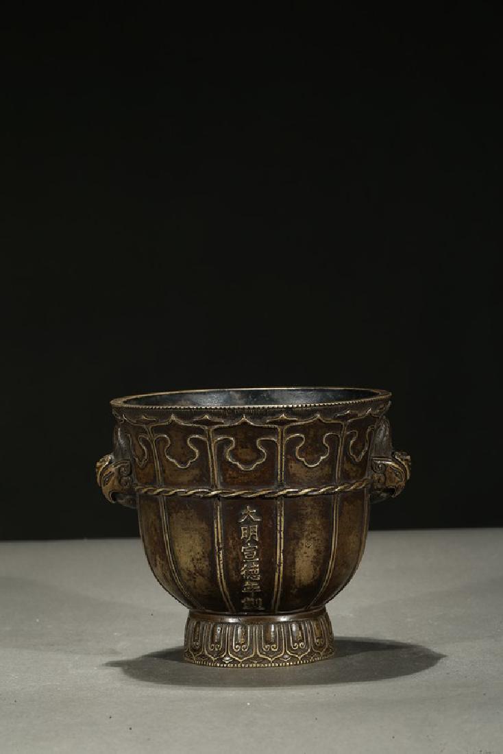 A BRONZE XUANDE CENSER (1 of 8)