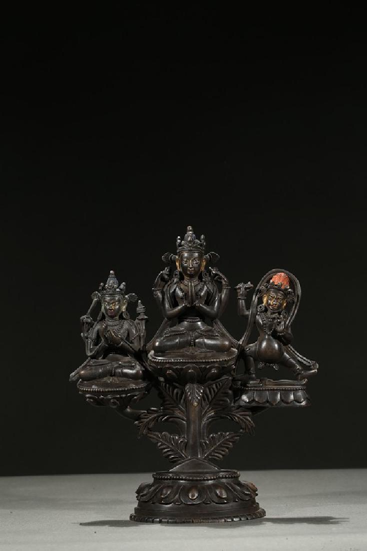 A PARCEL-GILT COPPER ALLOY BUDDHA GROUP (1 of 5)