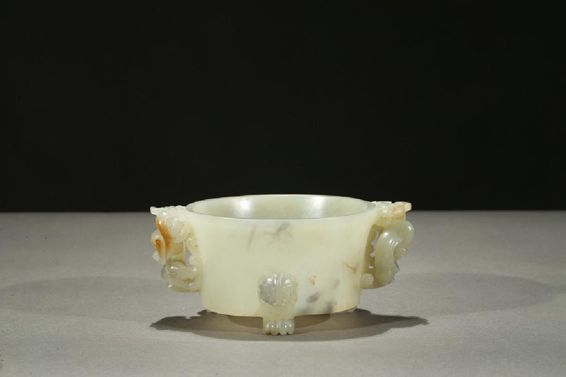 A WHITE JADE 'INSCRIPTION' TRIPOD CENSER (1 of 7)