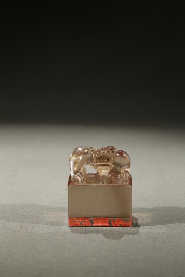 A CRYSTAL CARVED 'BIXIE' SEAL (1 of 6)