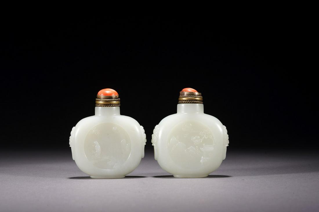 A PAIR OF CHINESE WHITE JADE CARVED SNUFF BOTTLES (1 of 10)