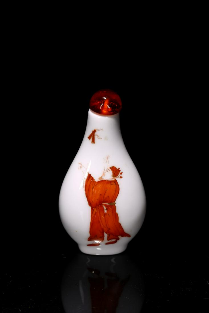 A CHINESE RED ENAMEL 'FIGURES' SNUFF BOTTLE (1 of 7)