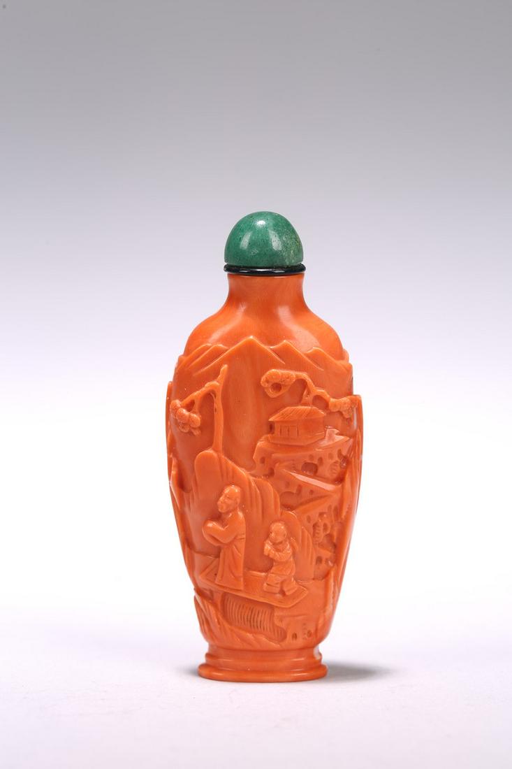 A CHINESE RED CORAL 'FIGURES AND LANDSCAPE' SNUFF BOTTLE (1 of 11)