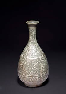 A KOREAN CELADON INLAID 'FISH' VASE: The body inlaid in white slip with a wide band of fish, the waisted neck and shoulder decorated with bands of florets, all on celadon glaze ground with craquelure; foot rim and shallow base unglazed.