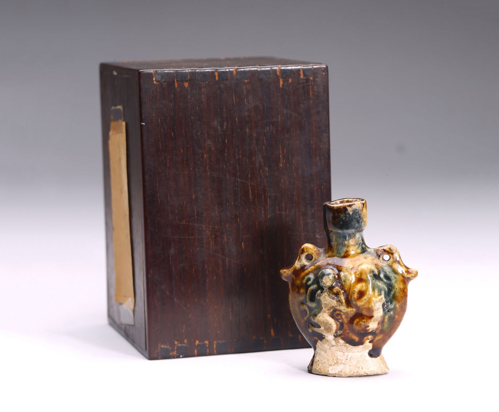 A Small Chinese Sancai Glazed Moulded Jar (1 of 8)