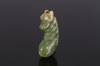 A Rare Chinese Green Jade 'Dragon' Embryo