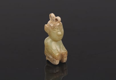 A Chinese Jade Kneeling Figure
