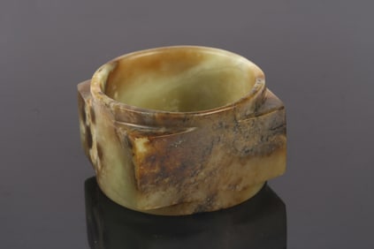 A Chinese Celadon Jade Cong