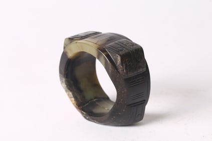A Chinese Celadon and Black Cong