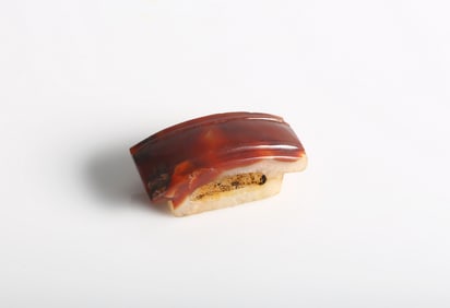 A Chinese Red Agate Sword Fitting